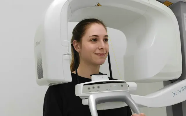 Patient having a 3D CT scan at the clinic